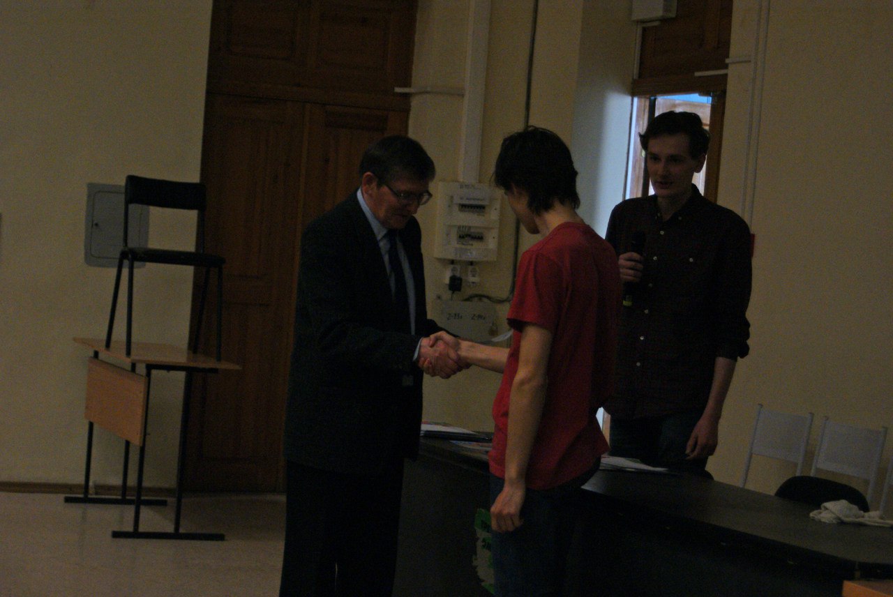 Receiving diploma at Novosibirsk student conference